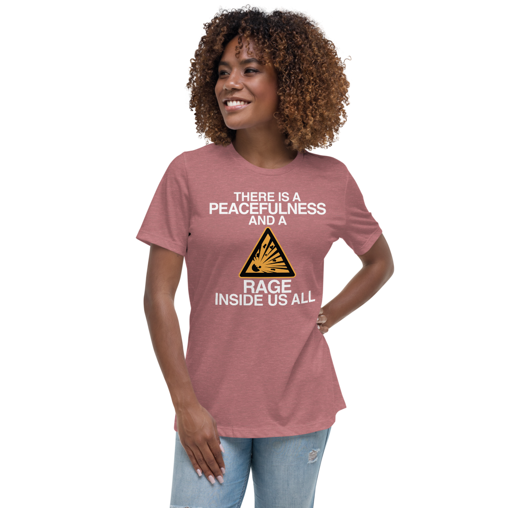 "There is a peacefulness and a rage inside us all" printed on a heather mauve women's relaxed t-shirt worn by a female