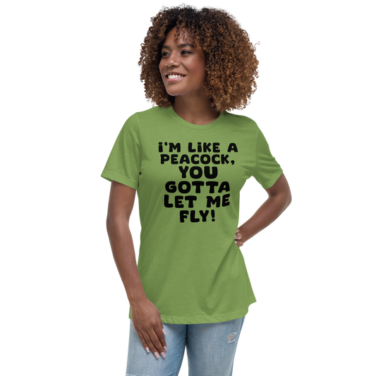 "I'm like a peacock, you gotta let me fly!" printed on a leaf women's relaxed t-shirt worn by a female