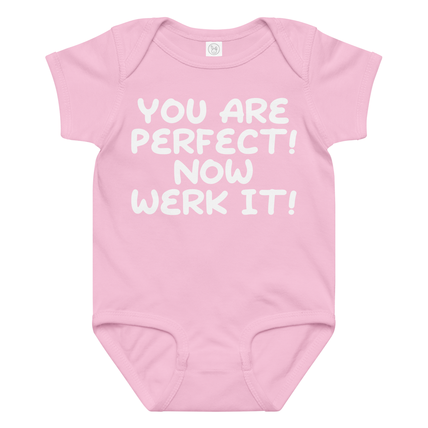 "You Are Perfect! Now Werk It!" printed on a pink baby jersey bodysuit laying on a flat surface amongst other clothes
