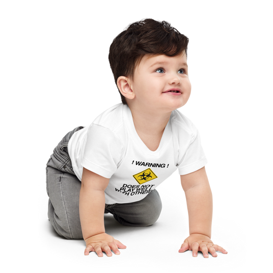 "!Warning! Does Not Play Well With Others" printed on a white baby jersey short sleeve tee worn by a male who is crawling