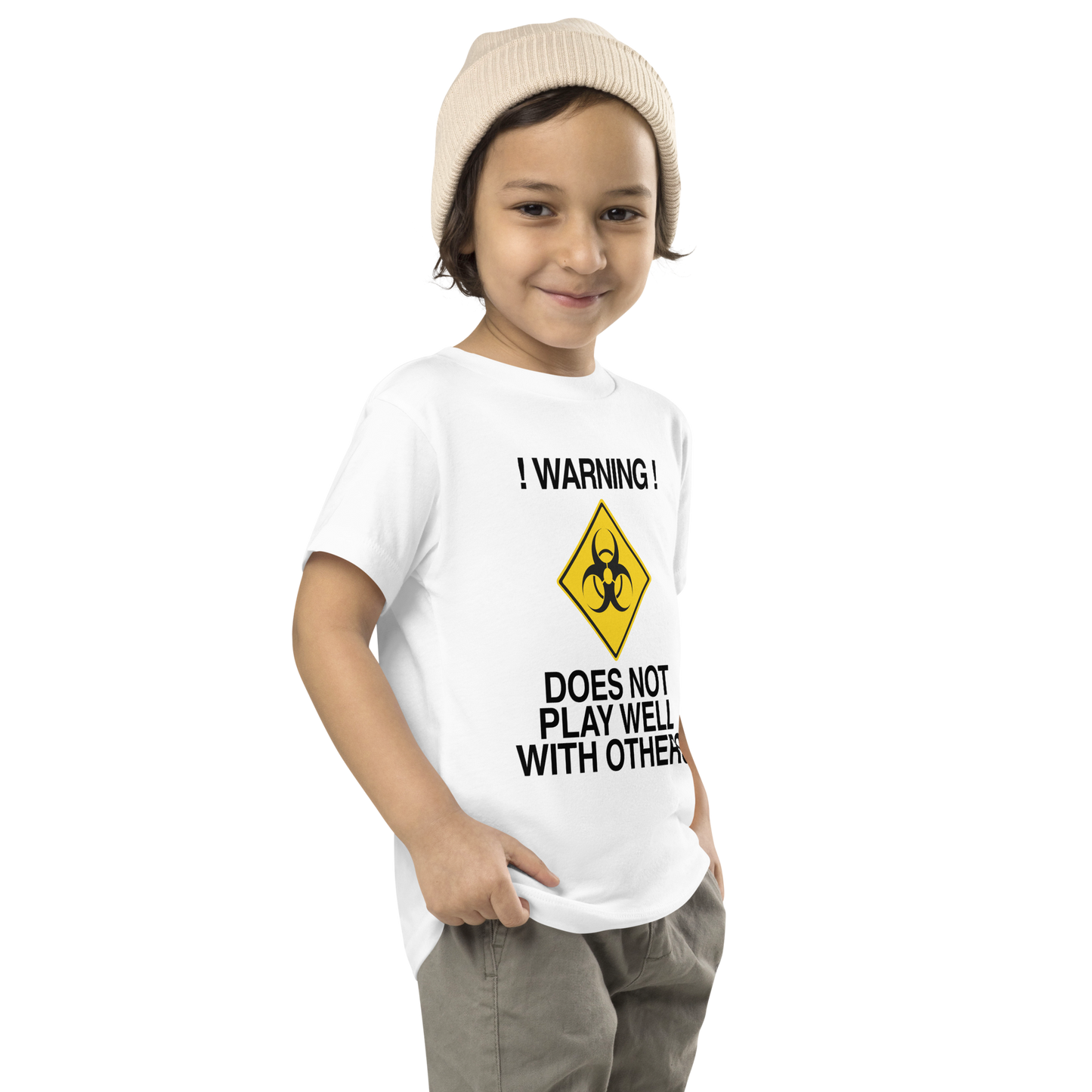 "!Warning! Does Not Play Well With Others" printed on a white toddler short sleeve tee worn by a male who is also wearing a knit cap
