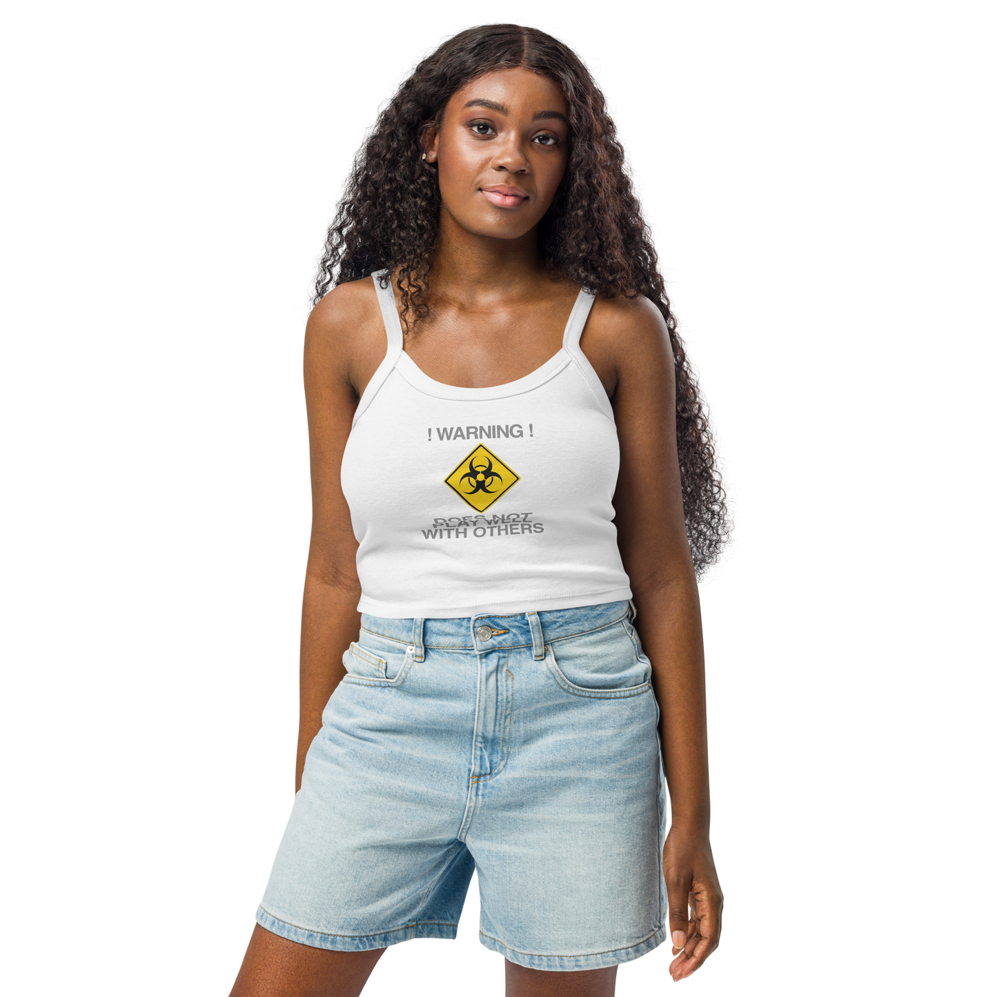 "!Warning! Does Not Play Well With Others" printed on a solid white blend women's micro-rib tanktop worn by a female