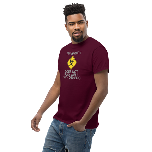 "!Warning! Does Not Play Well With Others" printed on a maroon unisex classic tee worn by a male