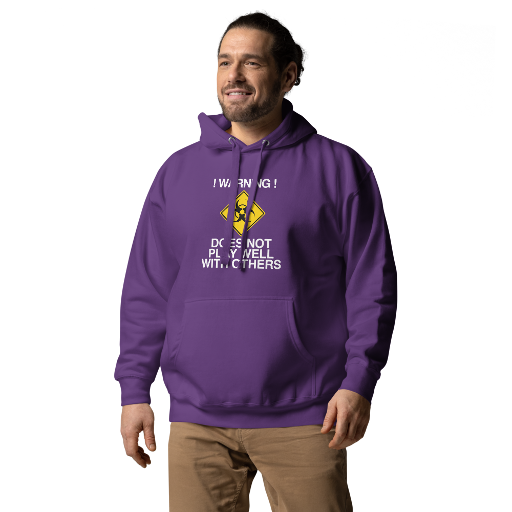 "!Warning! Does Not Play Well With Others" printed on a purple unisex hoodie worn by a male