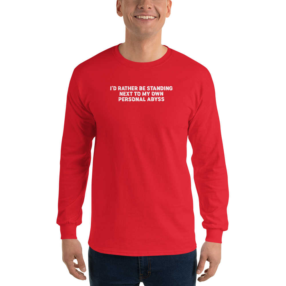 "I'd rather be standing next to my own personal abyss" printed on a red men's long sleeve shirt worn by a male