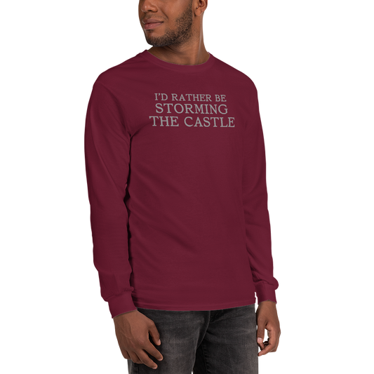 "I'd rather be storming the castle" printed on a maroon men's long sleeve shirt worn by a male
