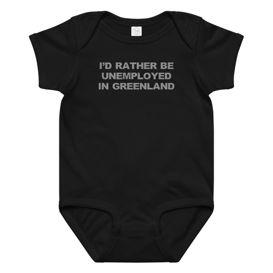"I'd rather be unemployed in greenland" printed on a black baby jersey bodysuit laying on a flat surface amongst other clothes