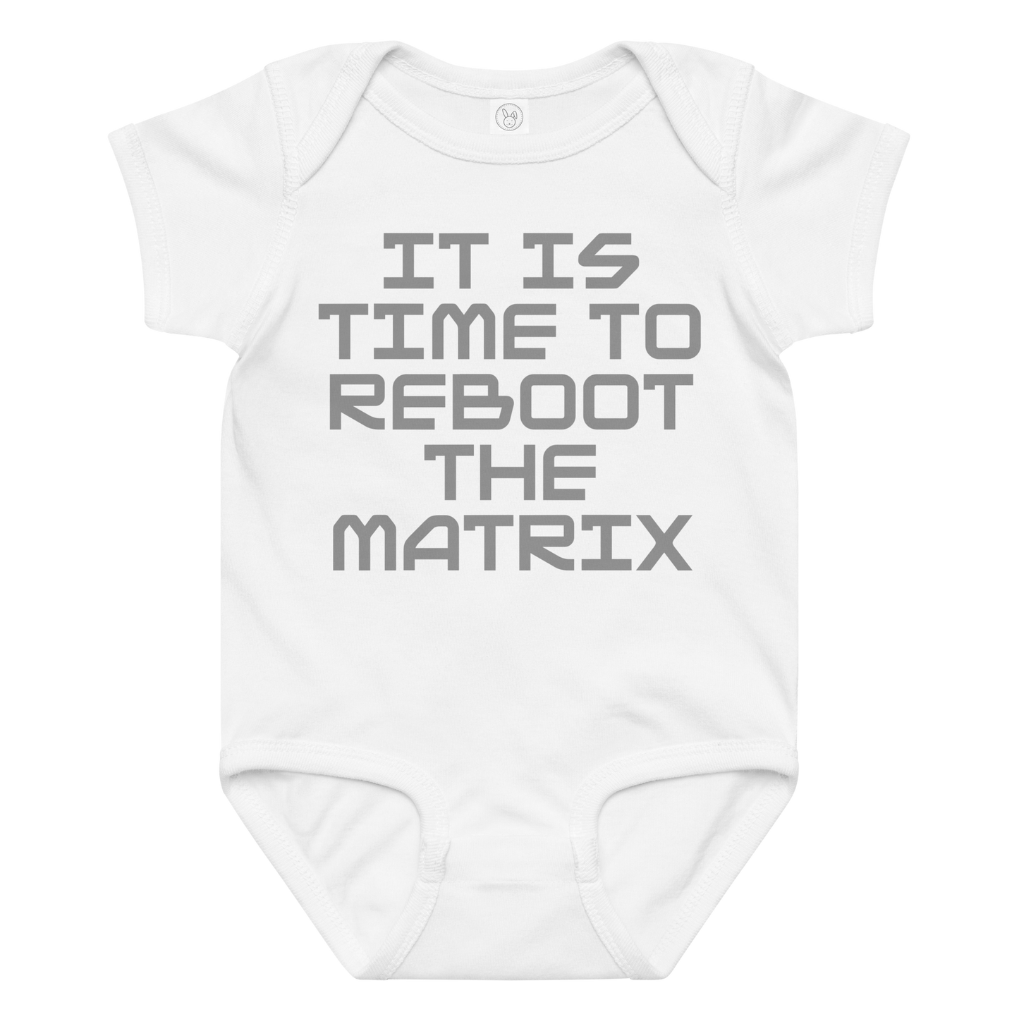 "It's time to reboot the matrix" printed on a white baby jersey bodysuit laying on a flat surface amongst other clothes