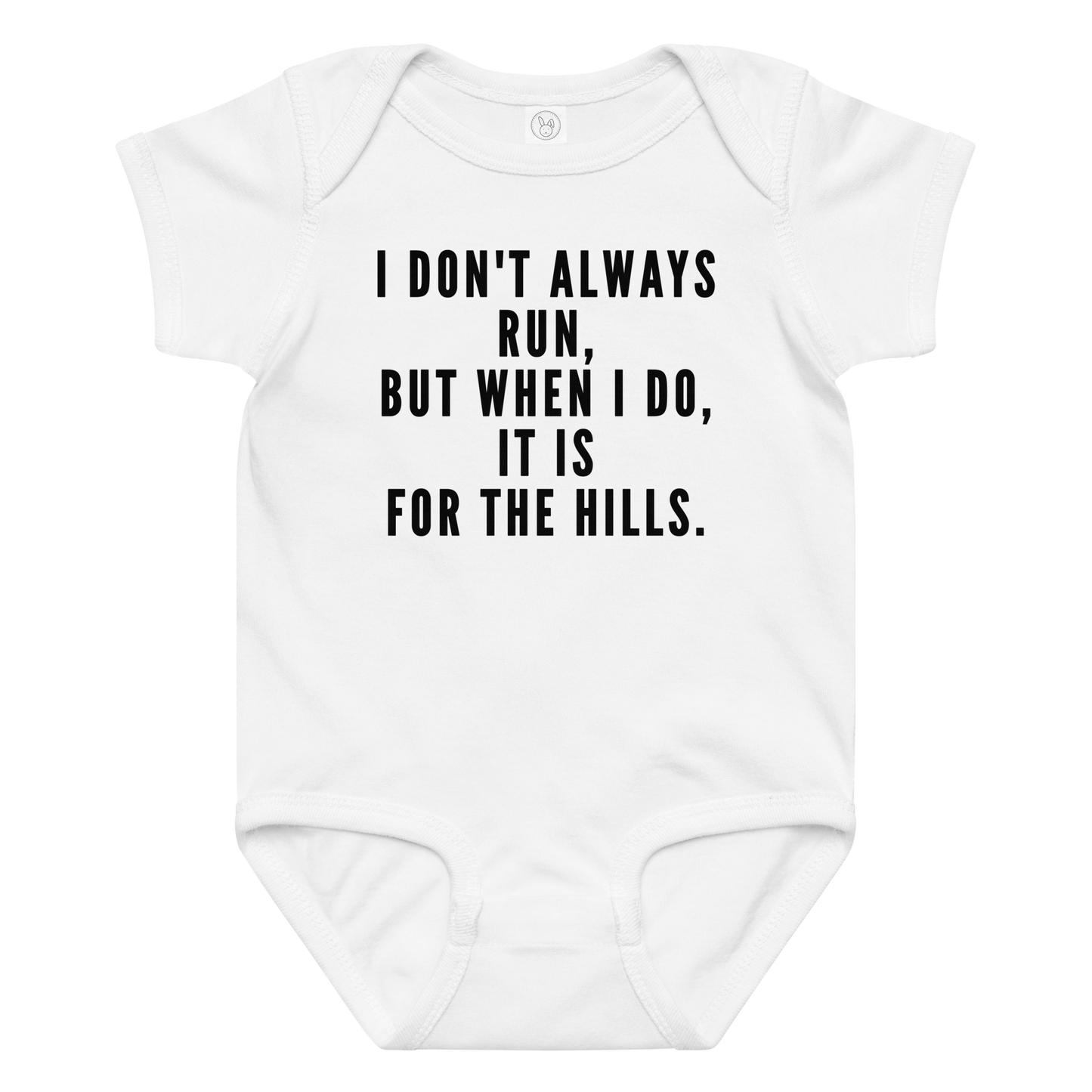 "I don't always run, but when I do, it is for the hills." printed on a white baby jersey bodysuit laying on a flat surface amongst other clothes
