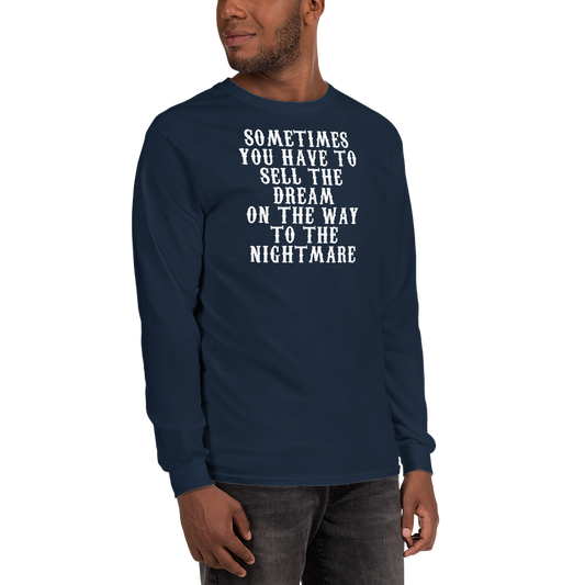"Sometimes you have to sell the dream on the way to the nightmare" printed on a navy men's long sleeve shirt worn by a male
