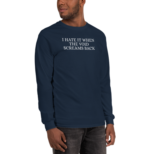 "I hate it when the void screams back" printed on a navy men's long sleeve shirt worn by a male