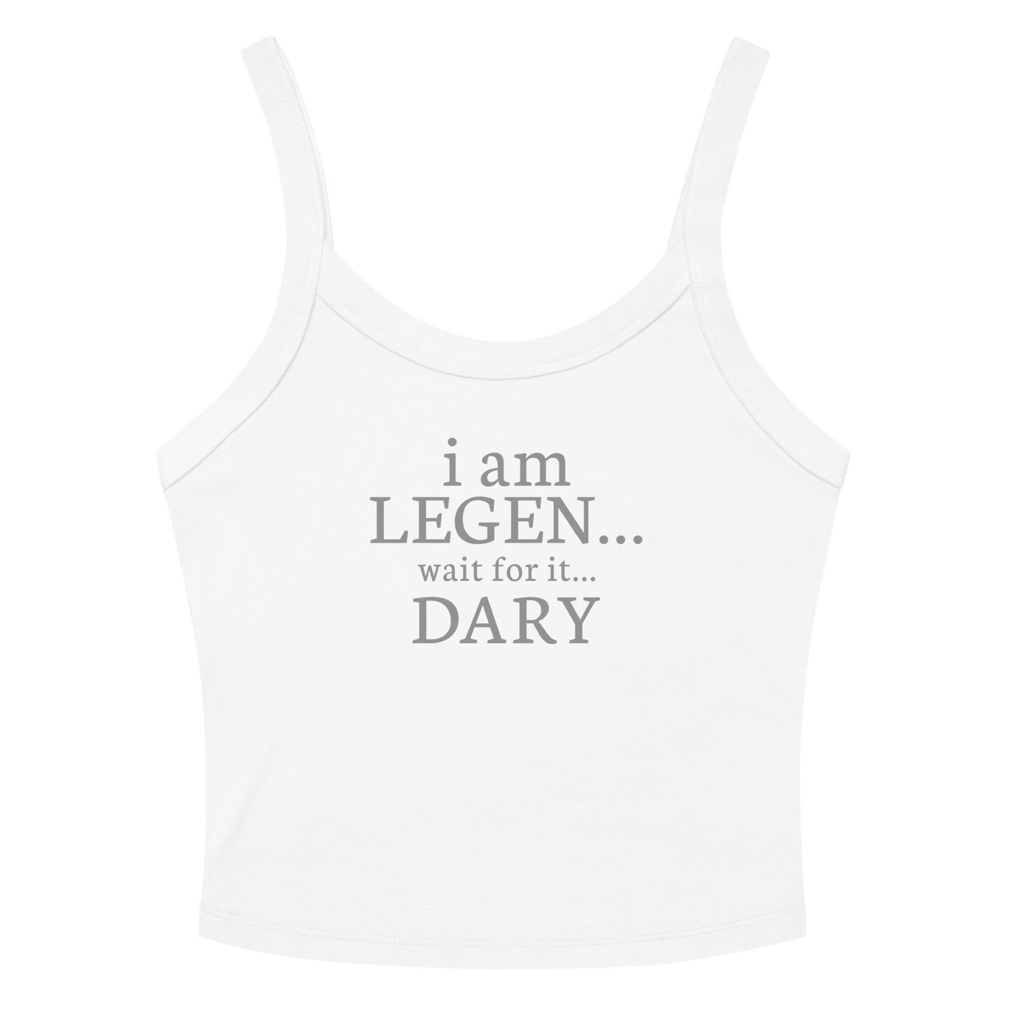 "I Am Legen... Wait For It... Dary" printed on a solid white blend women's micro-rib tanktop laying on a flat surface amongst sunglasses and shorts