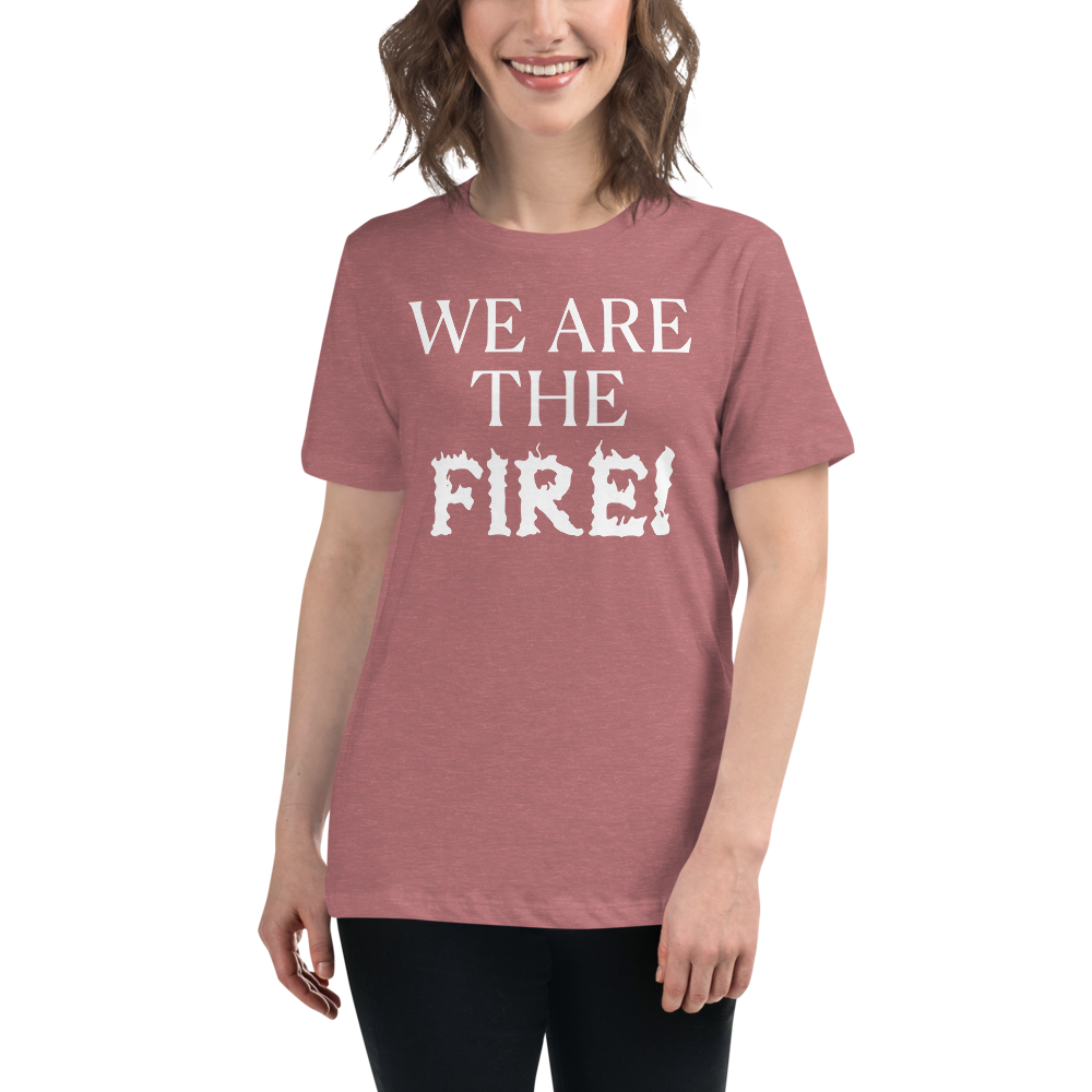 "We are the fire!" printed on a heather mauve women's relaxed t-shirt worn by a female