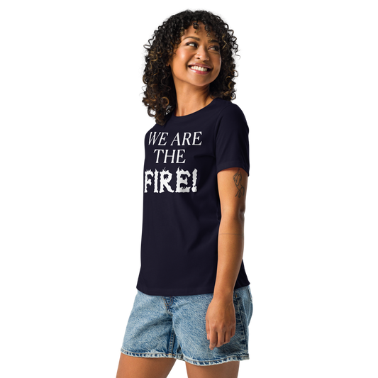"We are the fire!" printed on a navy women's relaxed t-shirt worn by a female