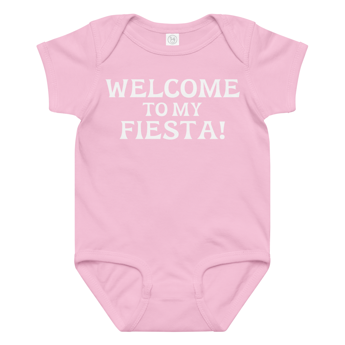 "Welcome to my fiesta!" printed on a pink baby jersey bodysuit laying on a flat surface amongst other clothes
