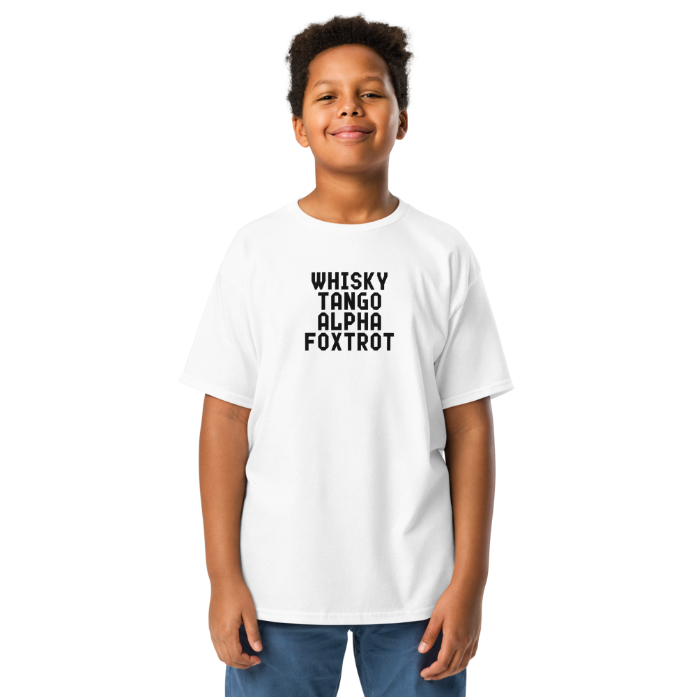 "Whisky Tango Alpha Foxtrot" printed on a white youth classic tee worn by a male