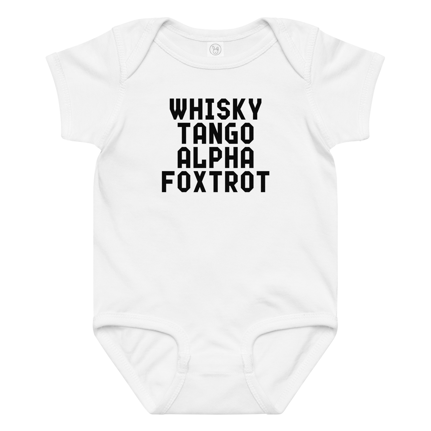 "Whisky Tango Alpha Foxtrot" printed on a white baby jersey bodysuit laying on a flat surface amongst other clothes