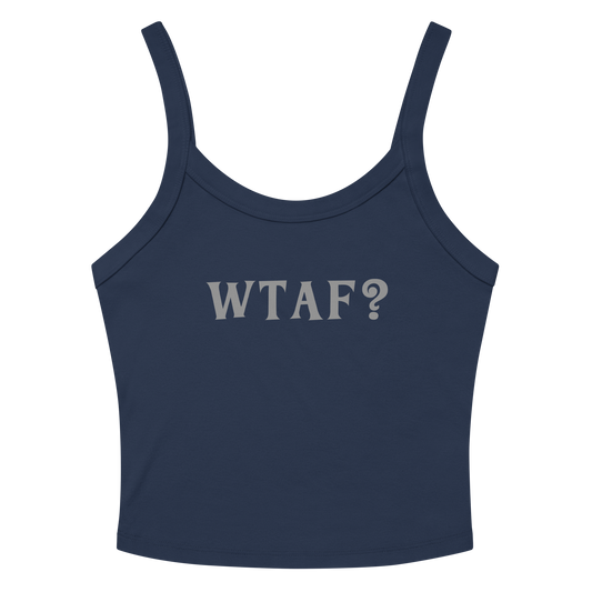 "WTAF?" printed on a solid navy blend women's micro-rib tanktop laying on a flat surface amongst sunglasses and shorts