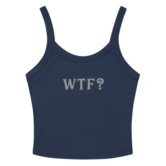 "WTF? (What the f#ck?)" printed on a solid navy blend women's micro-rib tanktop laying on a flat surface amongst sunglasses and shorts