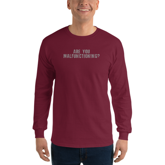 "Are you malfunctioning?" printed on a maroon men's long sleeve shirt worn by a male