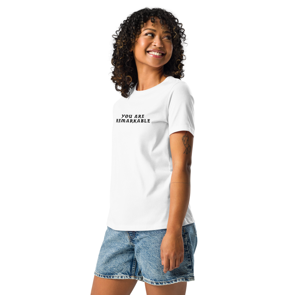 "You are remarkable" printed on a white women's relaxed t-shirt worn by a female