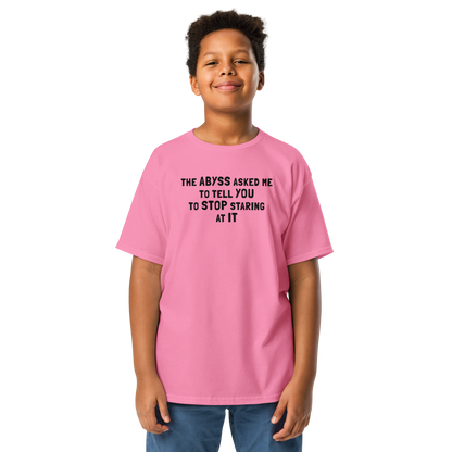 "The Abyss asked me to tell you to stop staring at it" printed on a azalea youth classic tee worn by a male