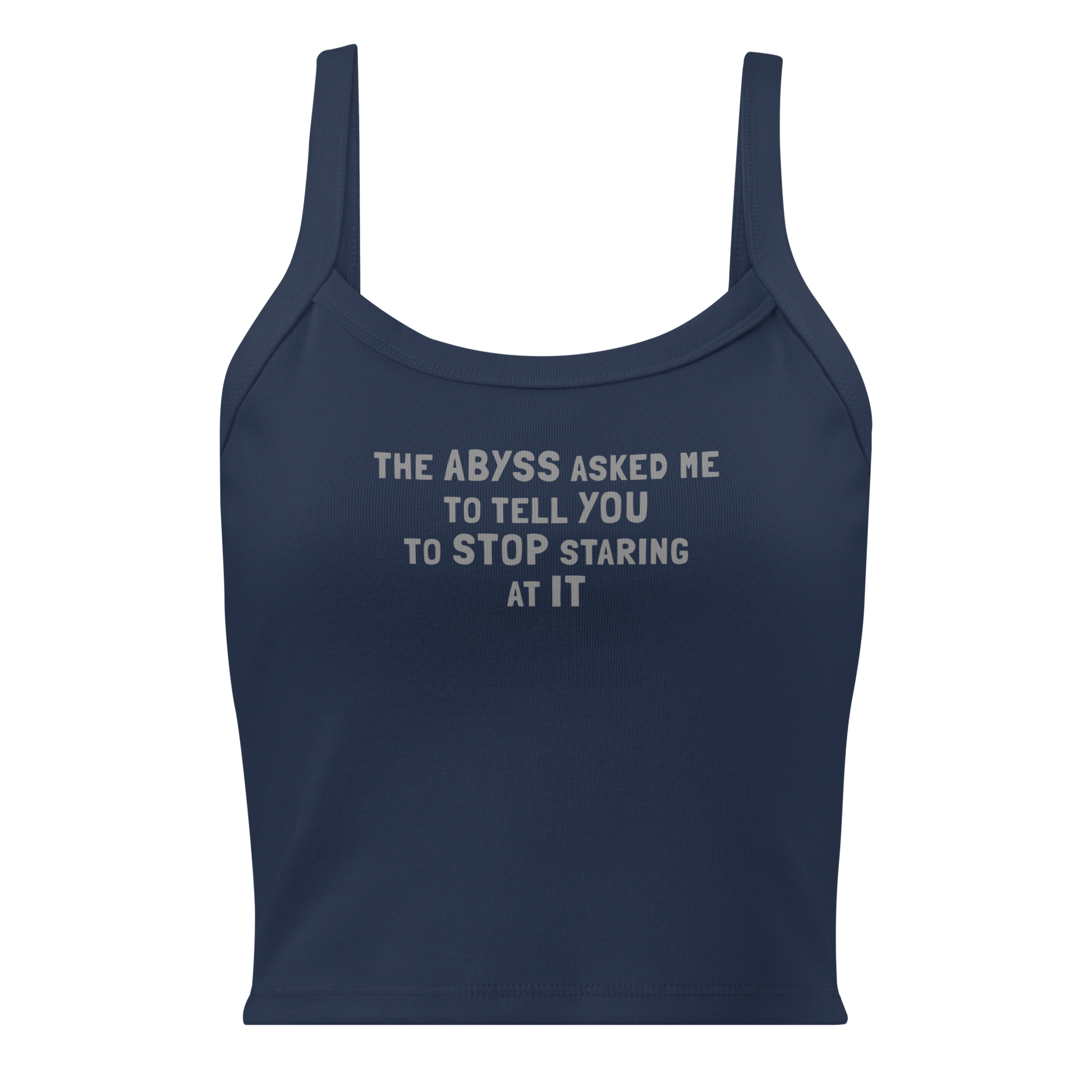"The Abyss asked me to tell you to stop staring at it" printed on a solid navy blend women's micro-rib tanktop laying on a flat surface