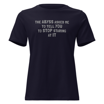 "The Abyss asked me to tell you to stop staring at it" printed on a navy on an invisible / simulated body