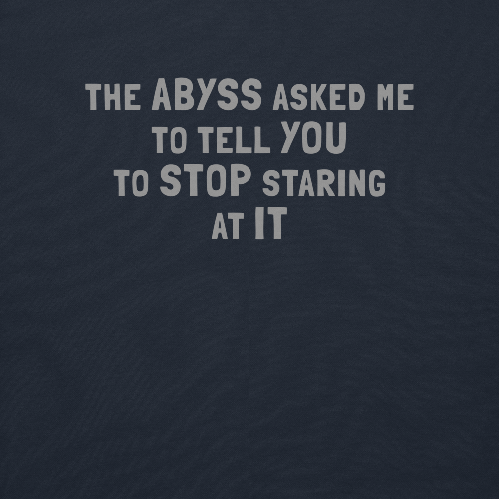 "The Abyss asked me to tell you to stop staring at it" printed on a navy blazer background
