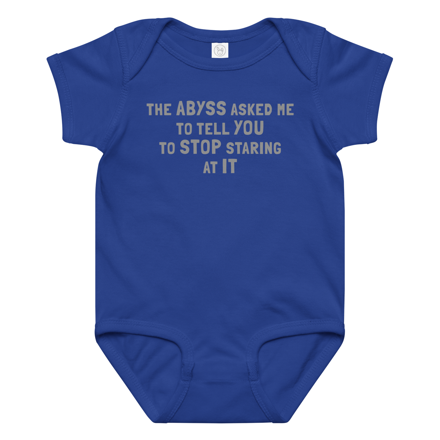 "The Abyss asked me to tell you to stop staring at it" printed on a royal baby jersey bodysuit laying on a flat surface amongst other clothes
