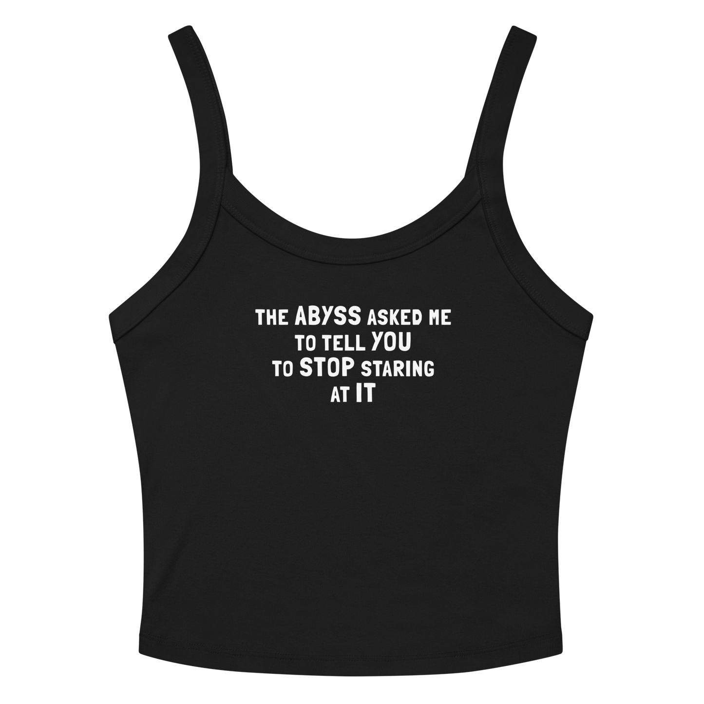 "The Abyss asked me to tell you to stop staring at it" printed on a solid black blend women's micro-rib tanktop laying on a flat surface amongst sunglasses and shorts