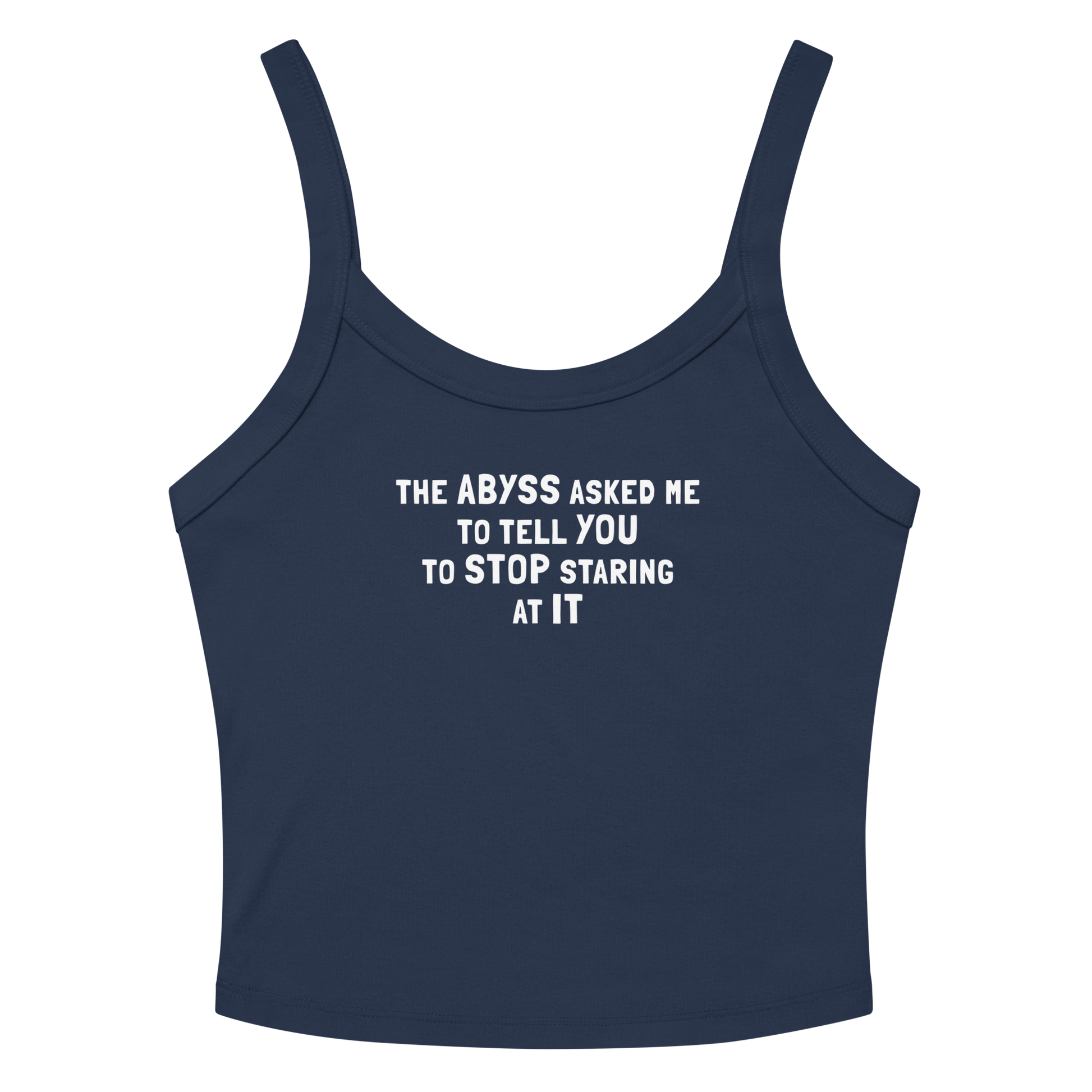 "The Abyss asked me to tell you to stop staring at it" printed on a solid navy blend women's micro-rib tanktop laying on a flat surface amongst sunglasses and shorts