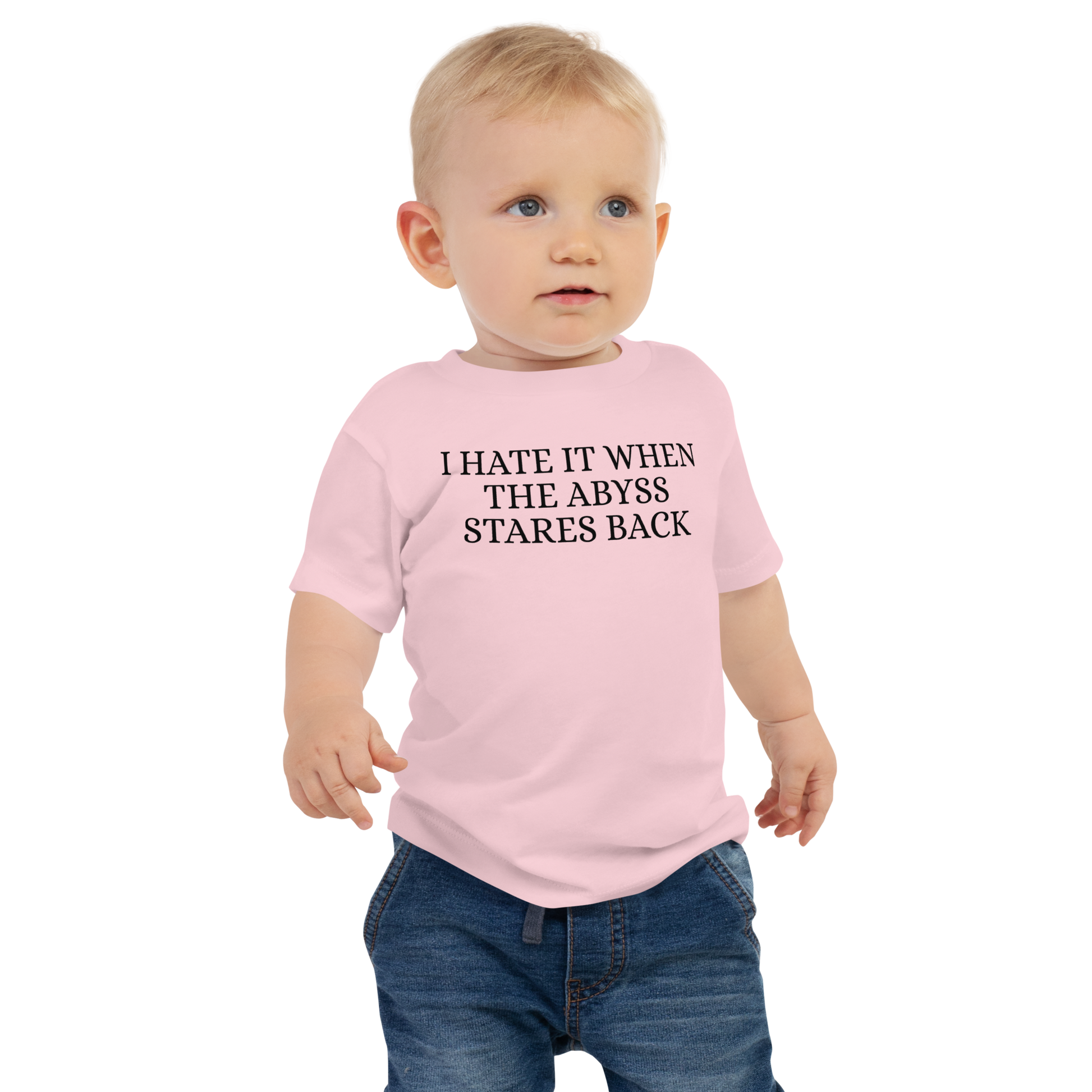 "I hate it when the abyss stares back" printed on a pink baby jersey short sleeve tee worn by a male