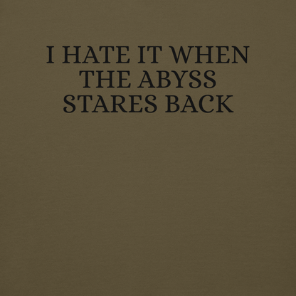 "I hate it when the abyss stares back" printed on a military green background