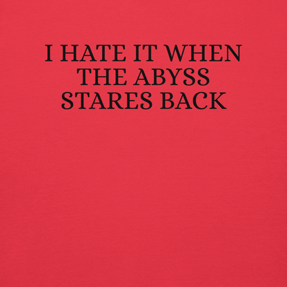 "I hate it when the abyss stares back" printed on a team red background