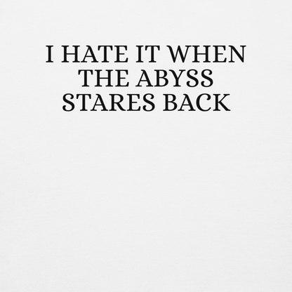 "I hate it when the abyss stares back" printed on a white background