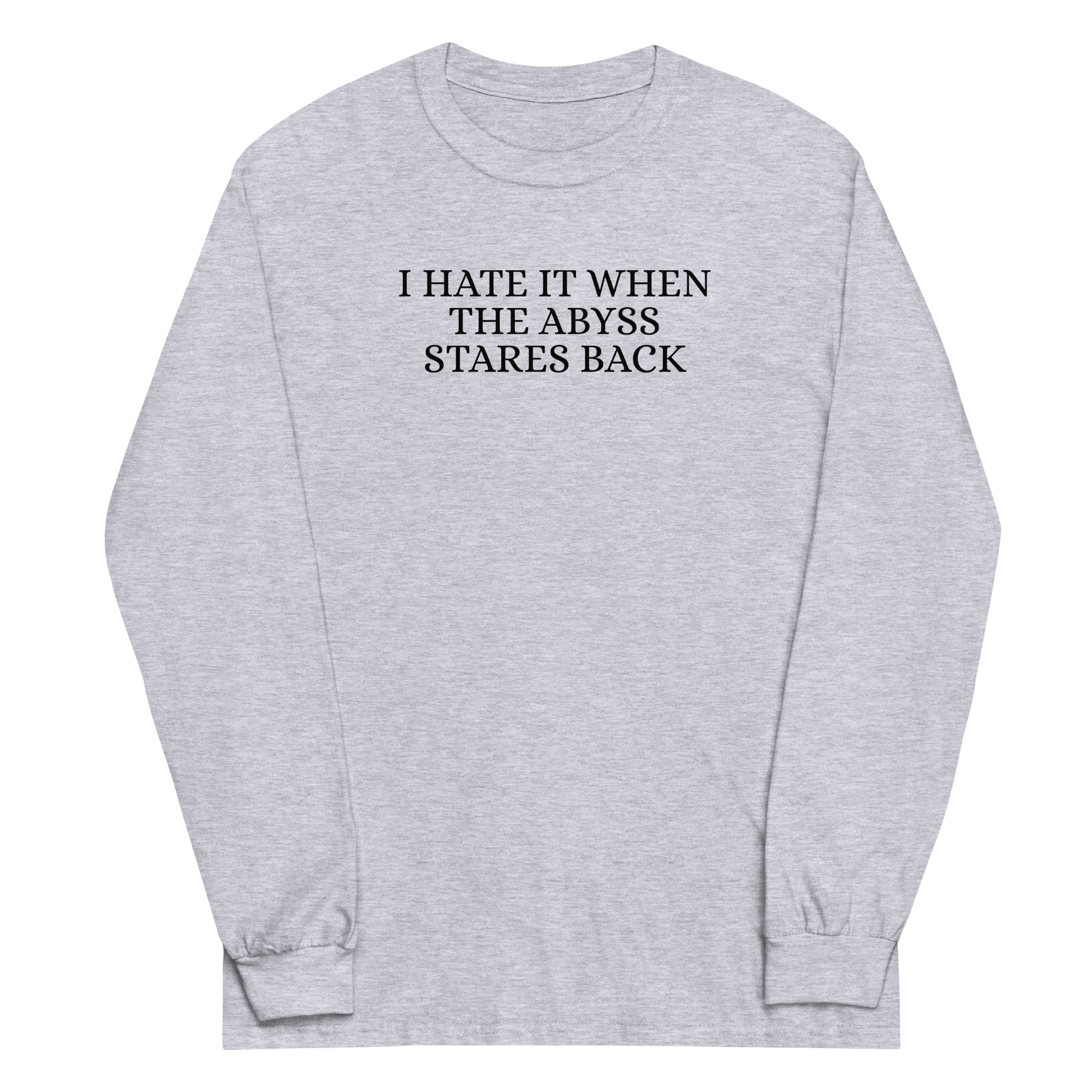 "I hate it when the abyss stares back" printed on a sport grey men's long sleeve shirt laying on a flat surface
