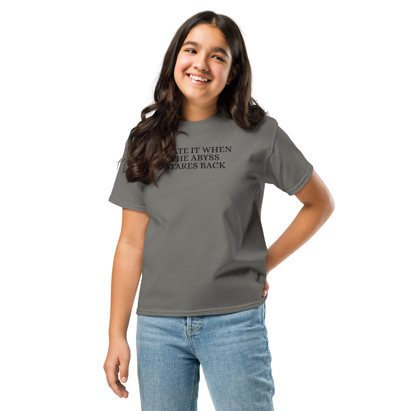 "I hate it when the abyss stares back" printed on a charcoal youth classic tee worn by a female