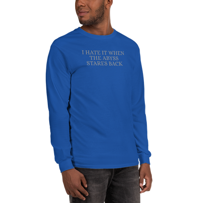"I hate it when the abyss stares back" printed on a royal men's long sleeve shirt worn by a male