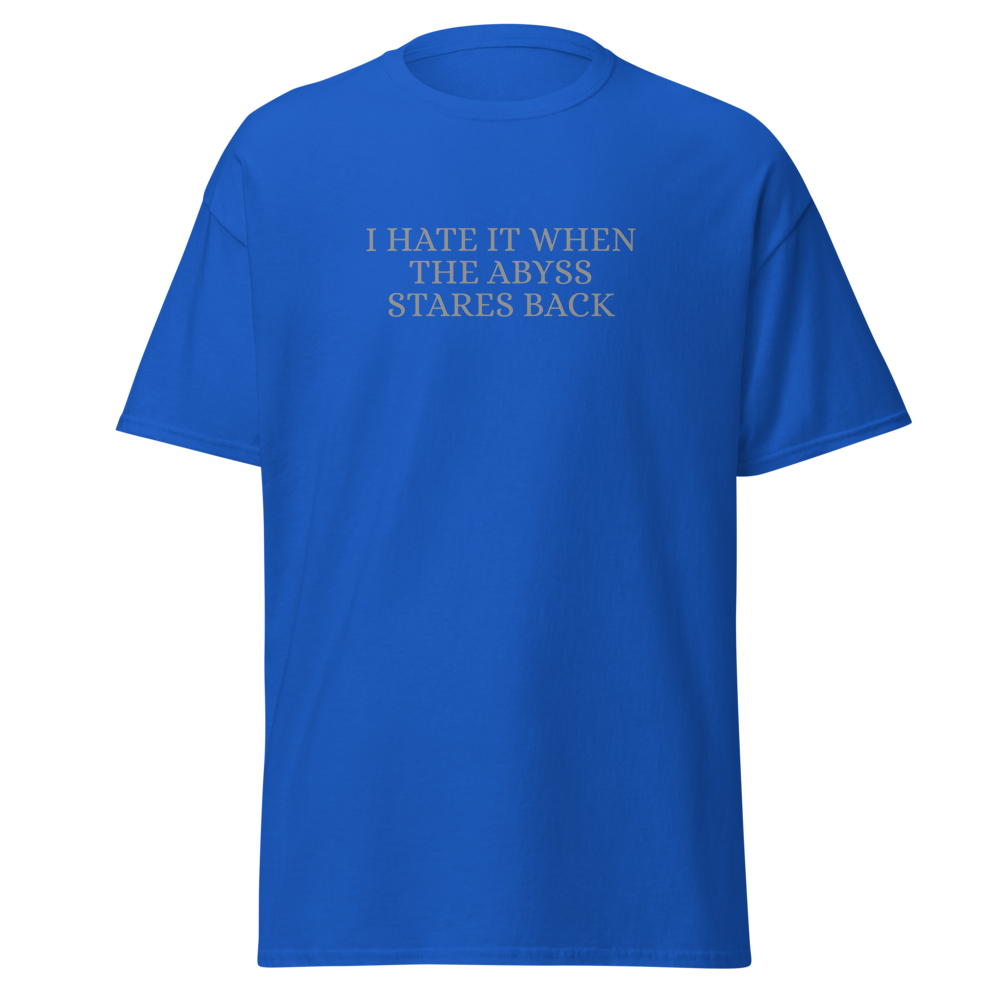 "I hate it when the abyss stares back" printed on a royal on an invisible body