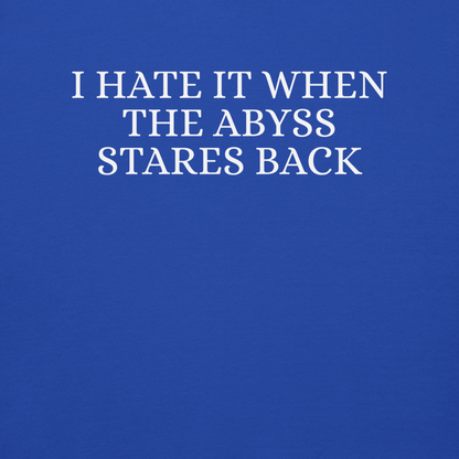 "I hate it when the abyss stares back" printed on a team royal background