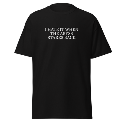 "I hate it when the abyss stares back" printed on a black on an invisible body