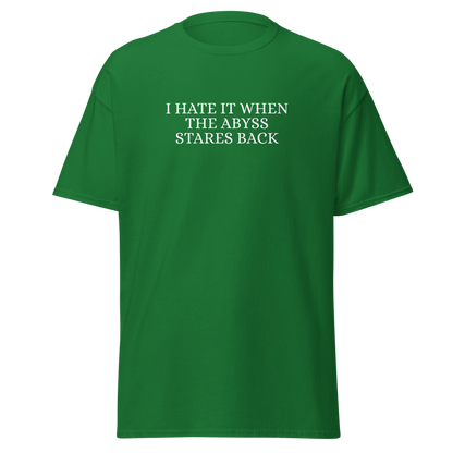 "I hate it when the abyss stares back" printed on a turf green on an invisible body