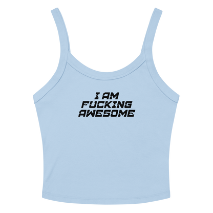 "I Am Fucking Awesome" printed on a solid baby blue blend women's micro-rib tanktop laying on a flat surface amongst sunglasses and shorts