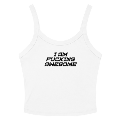 "I Am Fucking Awesome" printed on a solid white blend women's micro-rib tanktop laying on a flat surface amongst sunglasses and shorts