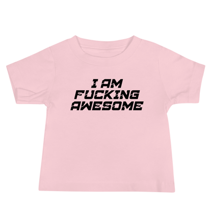"I Am Fucking Awesome" printed on a pink baby jersey short sleeve tee laying on a flat surface