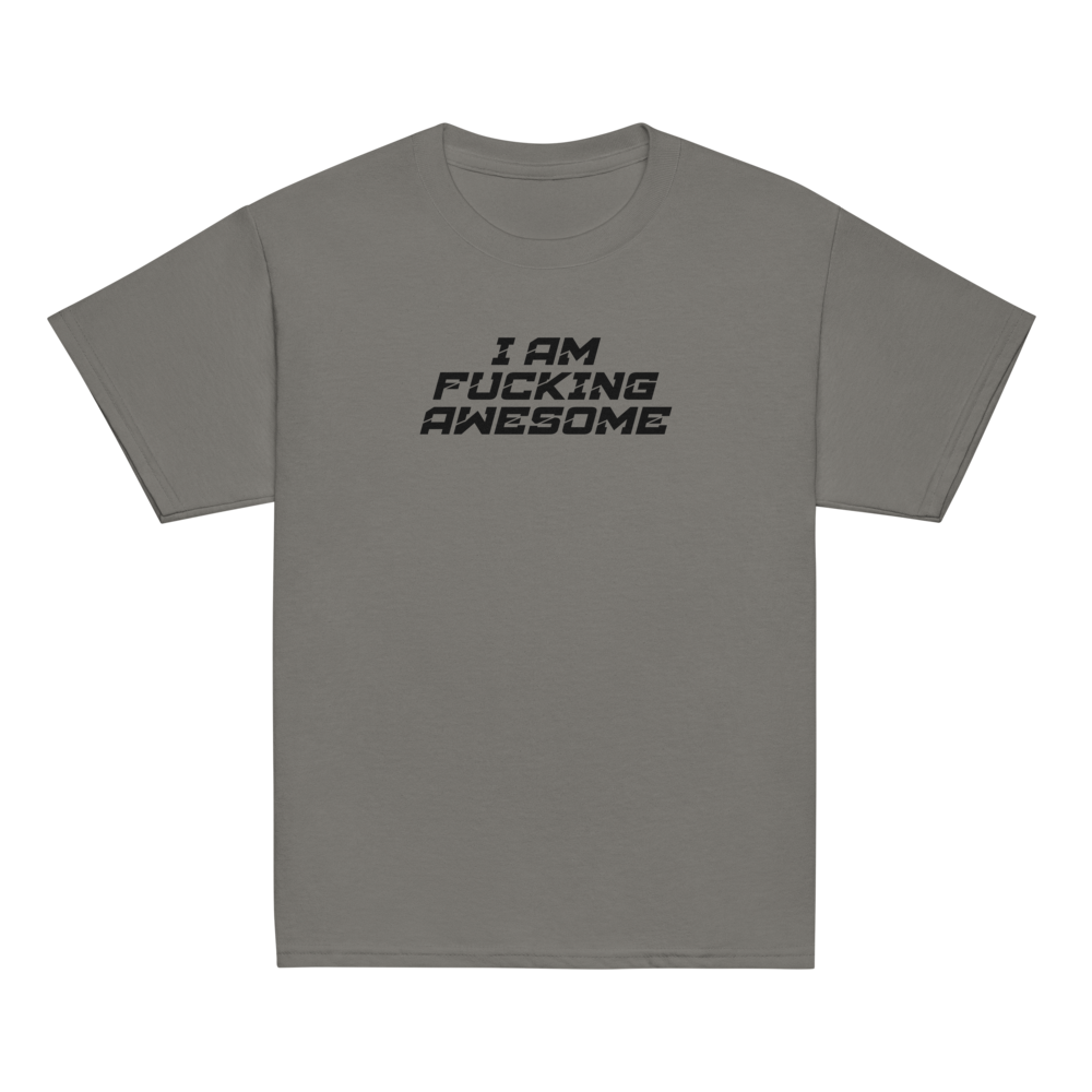 "I Am Fucking Awesome" printed on a charcoal youth classic tee laying on a flat surface
