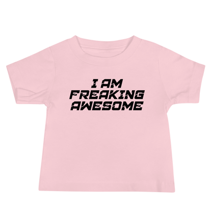 "I Am Freaking Awesome" printed on a pink baby jersey short sleeve tee laying on a flat surface