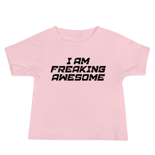 "I Am Freaking Awesome" printed on a pink baby jersey short sleeve tee laying on a flat surface