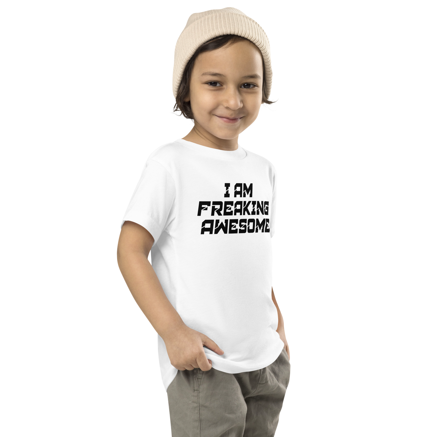 "I Am Freaking Awesome" printed on a white toddler short sleeve tee worn by a male who is also wearing a knit cap